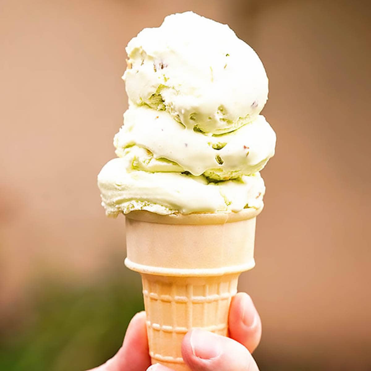 Pistachio Ice cream in sugar cone.