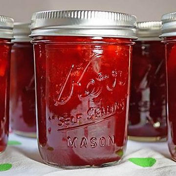 Jars of sealed strawberry preserves