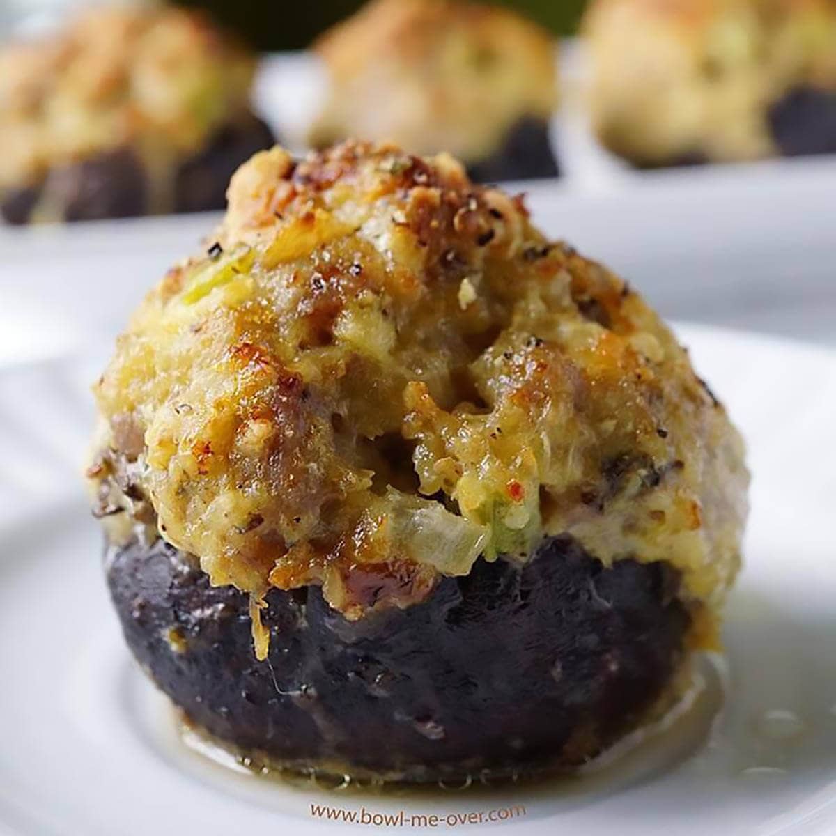 Stuffed Mushrooms on white plate.