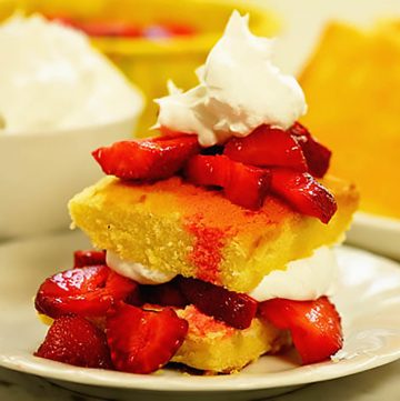 Shortcake layered with strawberries and whipped cream.
