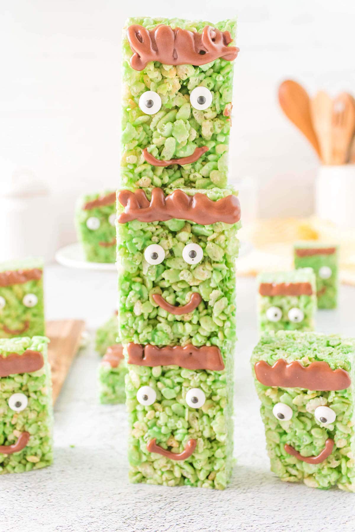 Stacks of Frankenstein Rice Crispy Treats decorated with little faces.