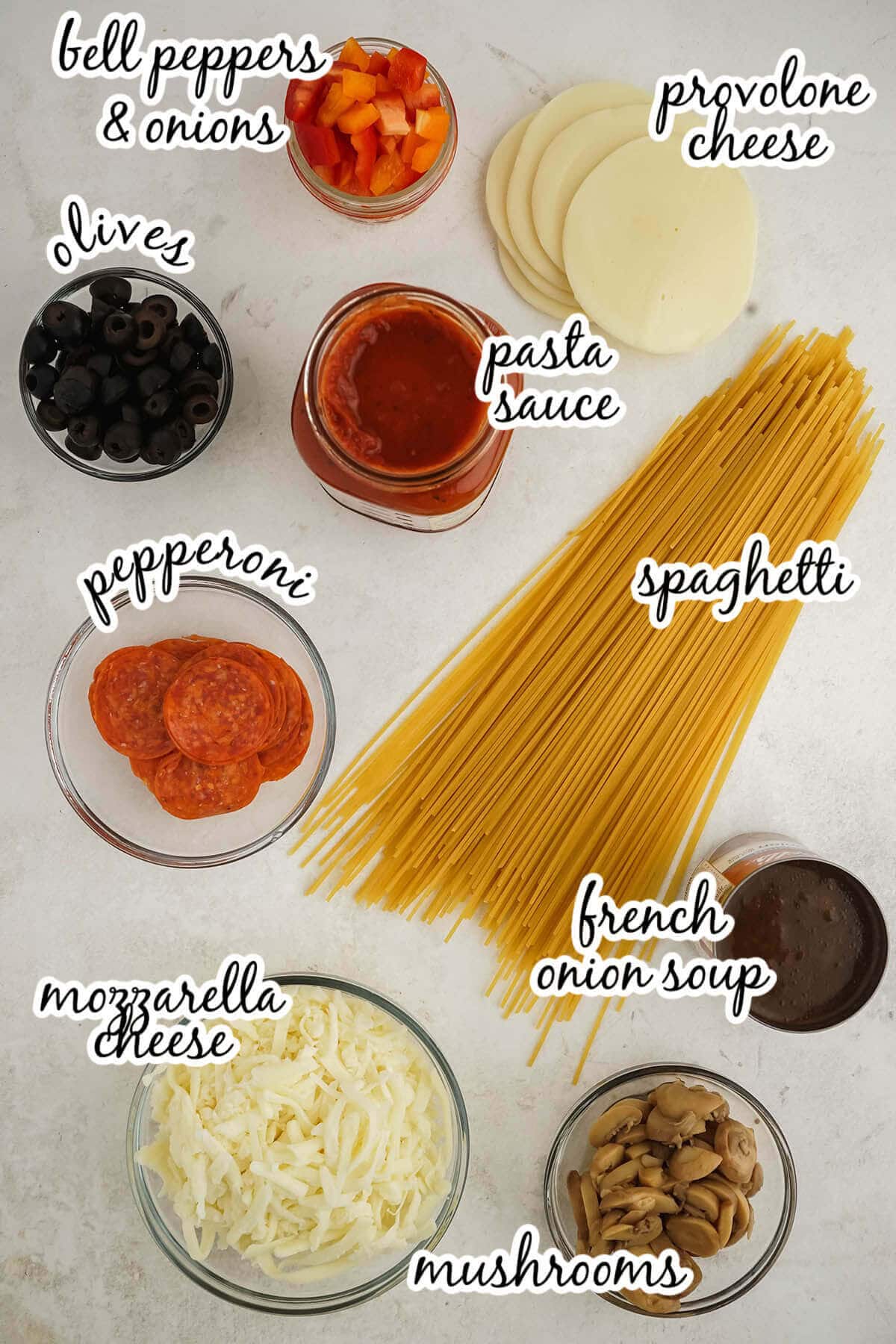 Ingredients needed to make Pizza Spaghetti Casserole. With print overlay.