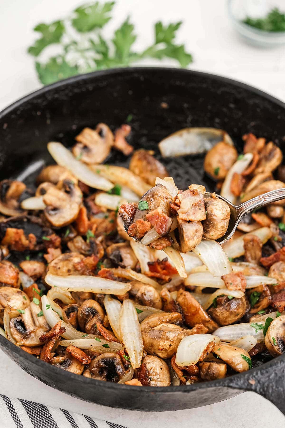 Cooked mushrooms and onions in cast iron skillet.