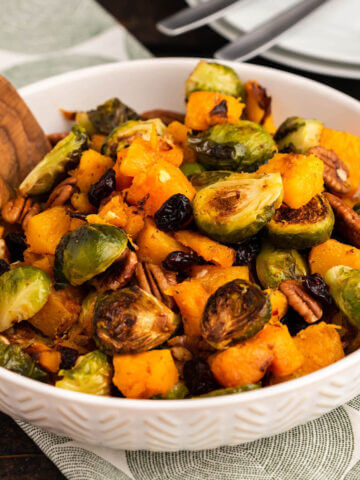 Roasted Butternut Squash and Brussels sprouts in serving bowl.