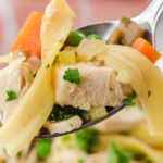 Chicken Soup with spoon. With Pinterest overlay.