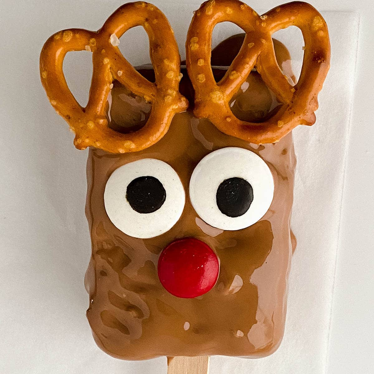 Reindeer Rice Krispie Treat with pretzel horns.
