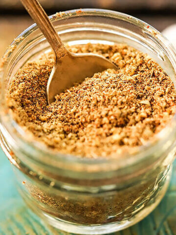 Old Bay Seasoning Mix in jar with spoon.