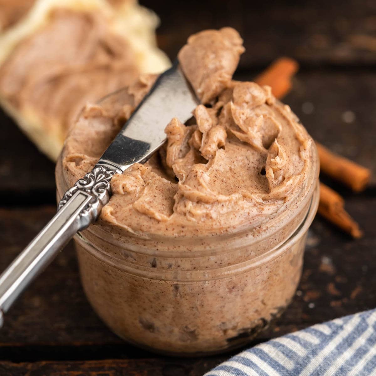 Texas Roadhouse Honey Recipe in jar with knife for spreading. 