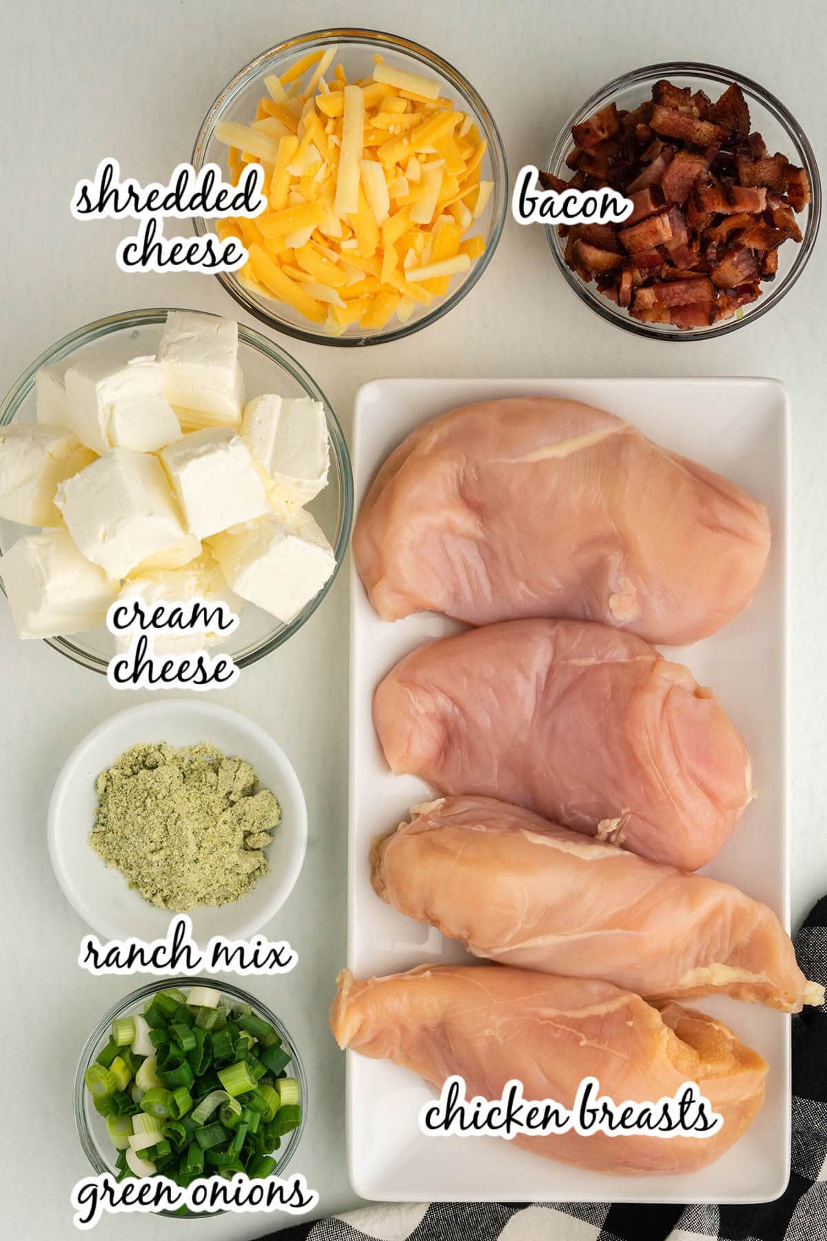 Ingredients to make slow cooker chicken bacon ranch recipe. With print overlay. 