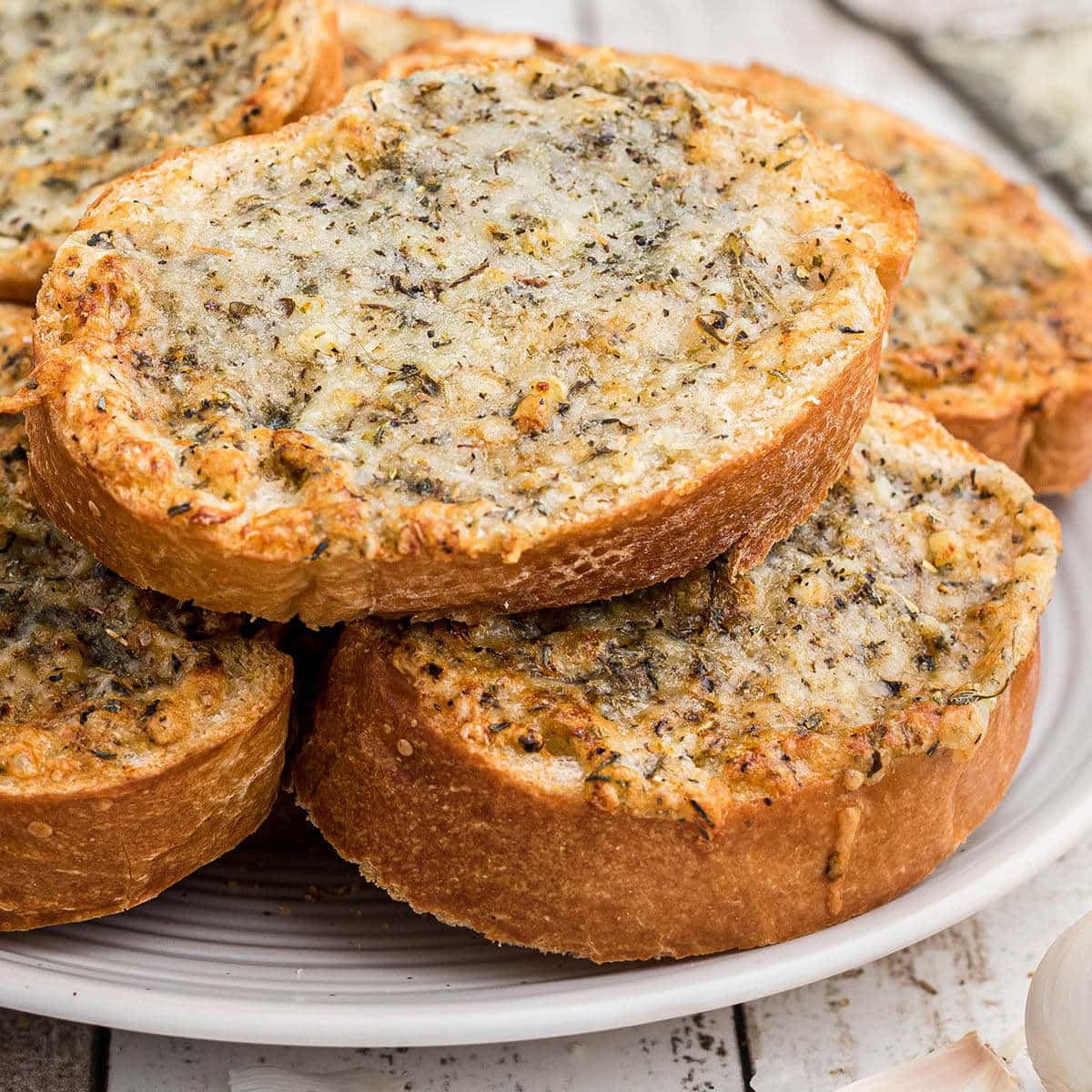 Crispy garlic bread on piled. on plate.