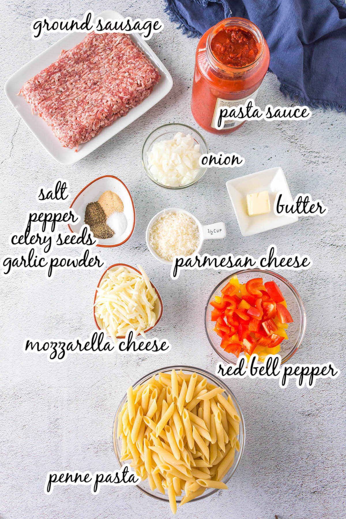 Ingredients to make Sausage Peppers and Onions Pasta, with print overlay. 