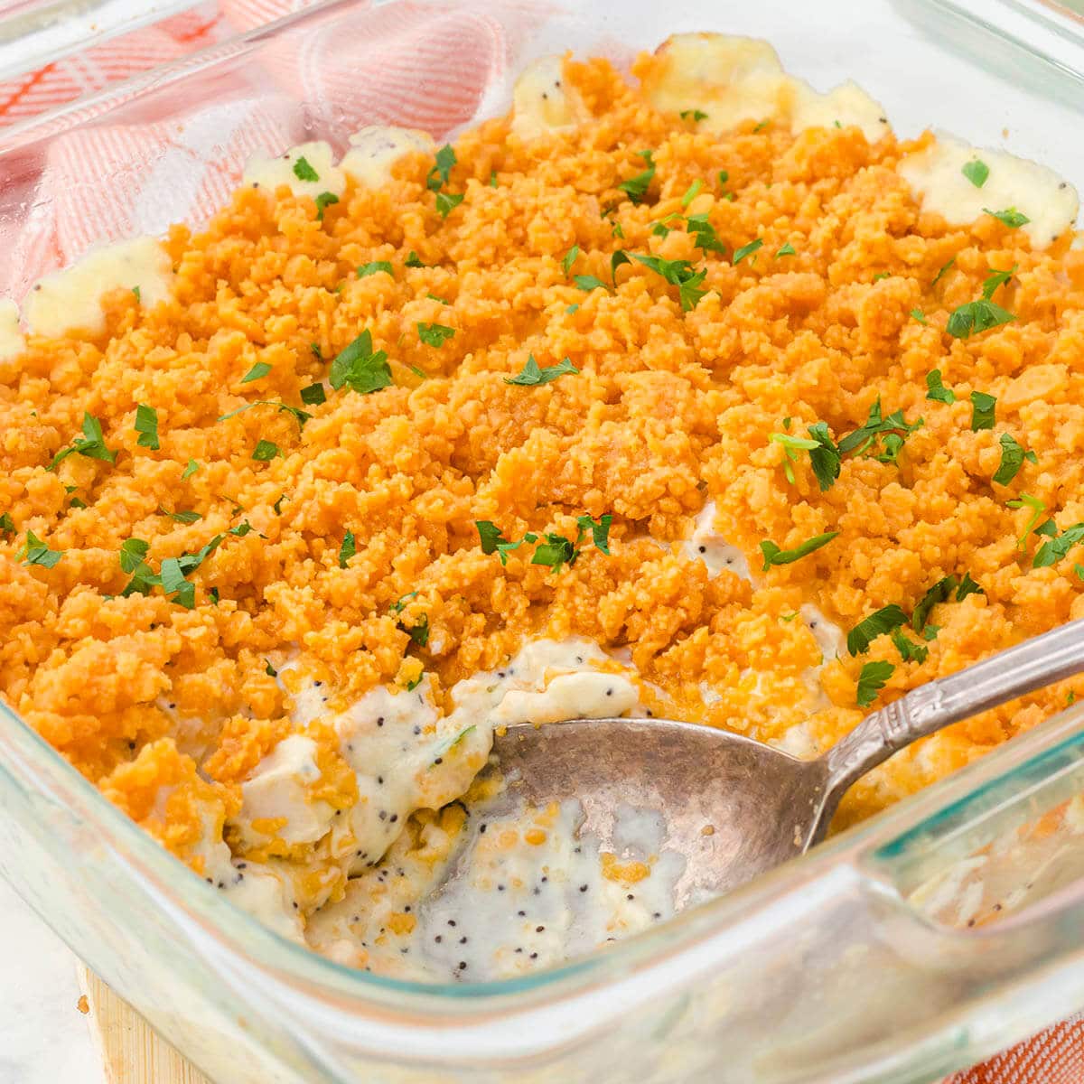 Poppy seed chicken casserole in baking dish.