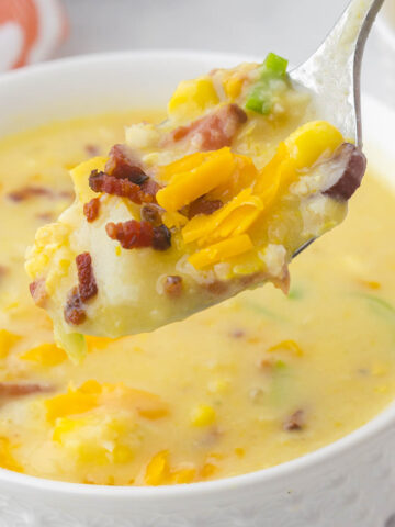 Potato Corn Soup Recipe in bowl with spoon.