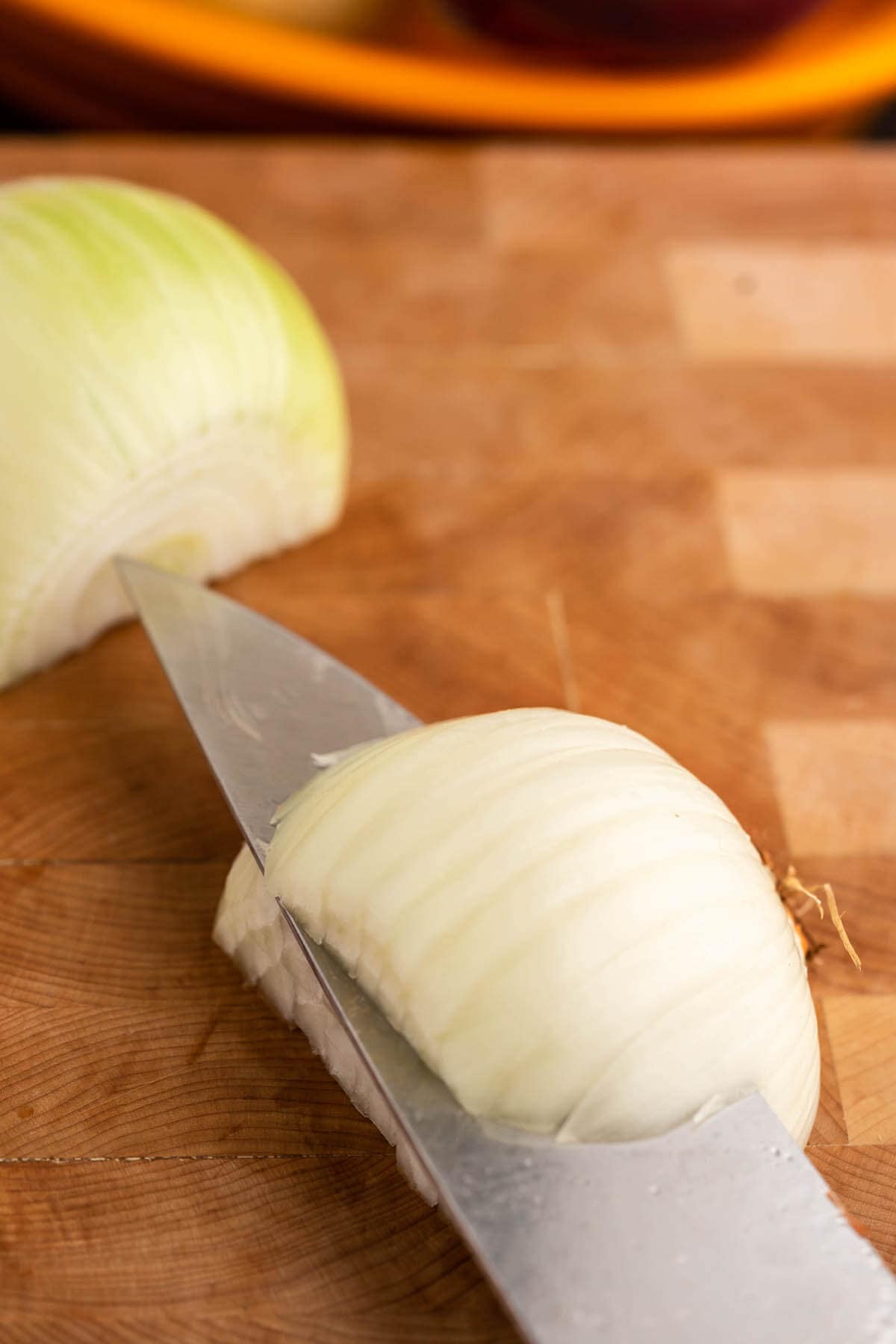 Knife making horizontal in onion.