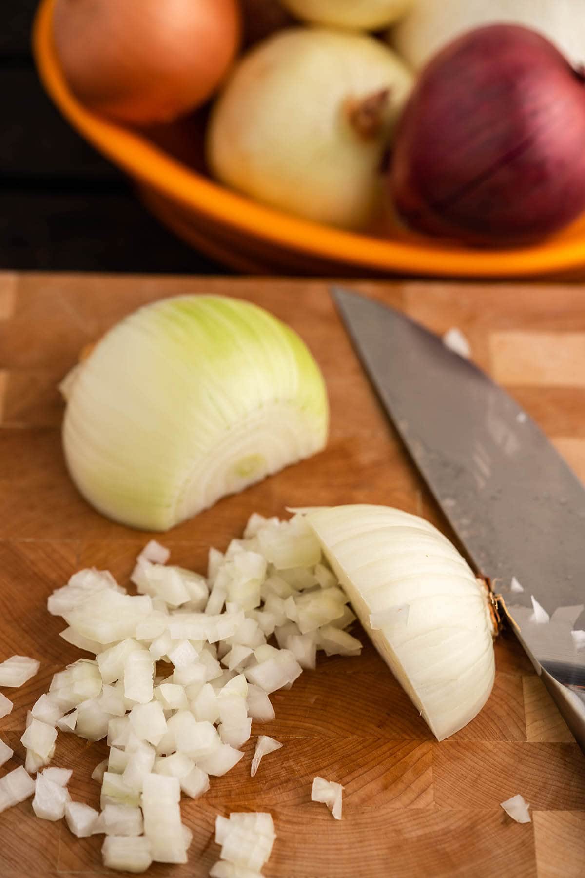 Diced onion on cutting board.