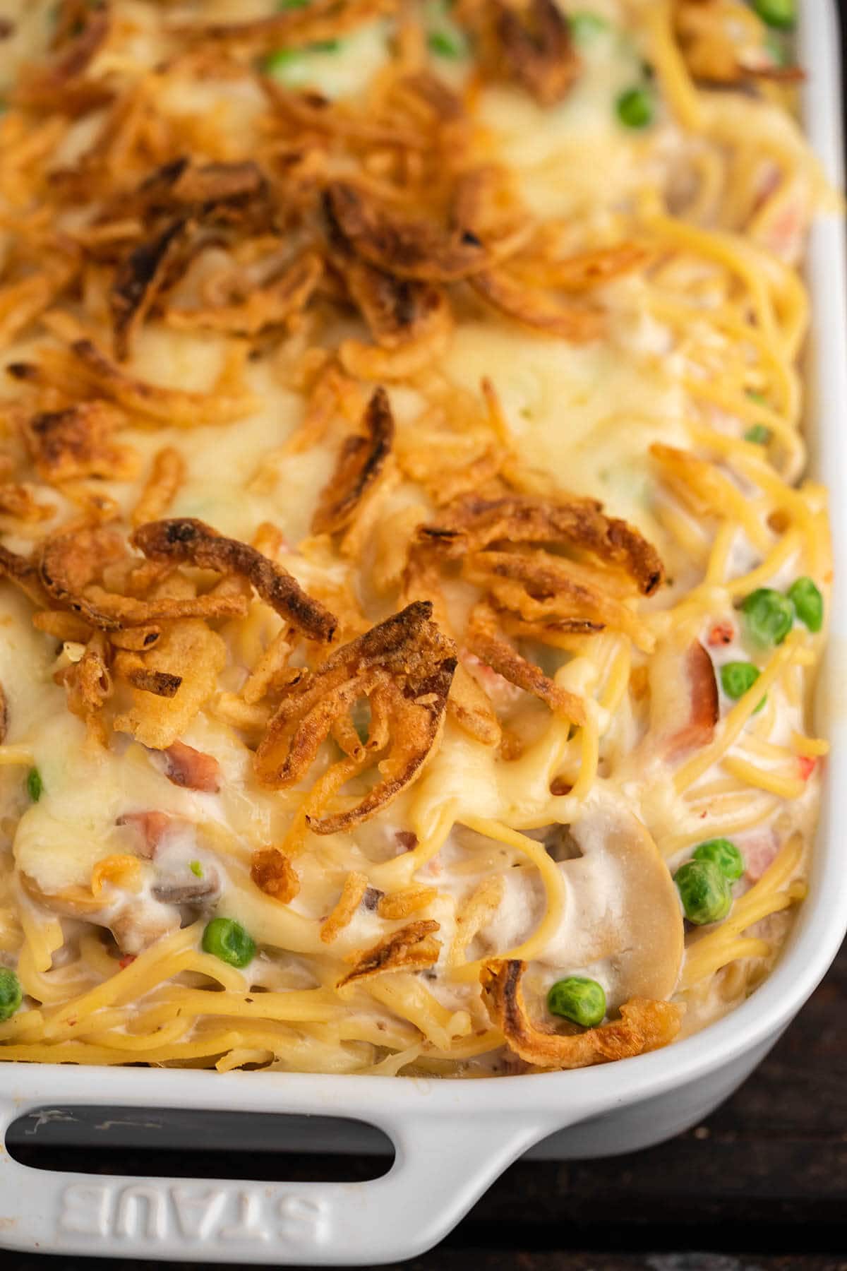 Casserole dish filled with baked ham tetrazzini.