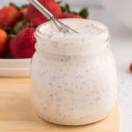 Poppyseed Salad Dressing in jar with whisk.