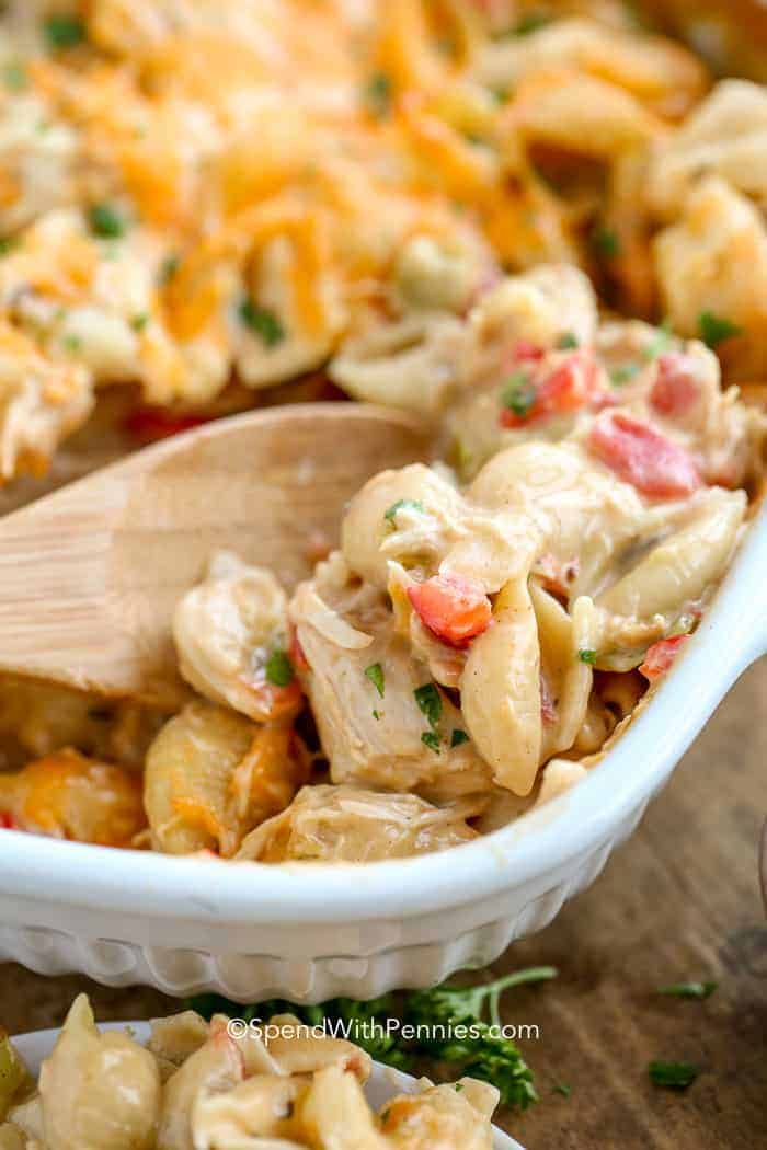 Cheesy chicken and pasta in baking dish. 