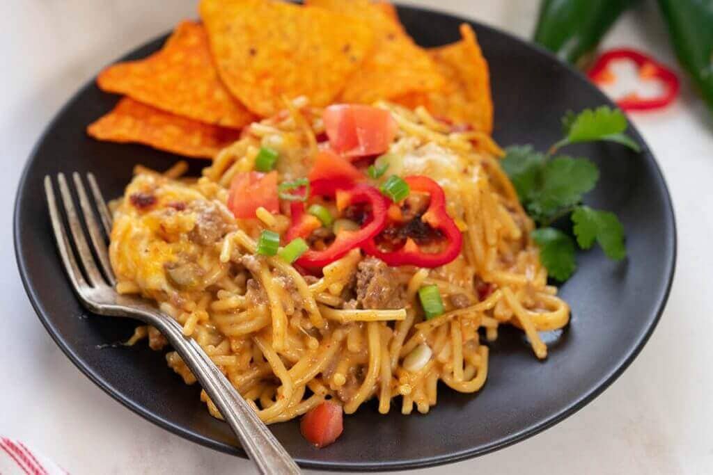 Taco spaghetti kasserole on plate. 