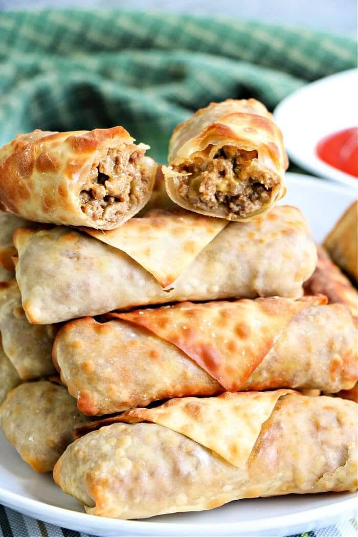 Stack of ground beef egg rolls.