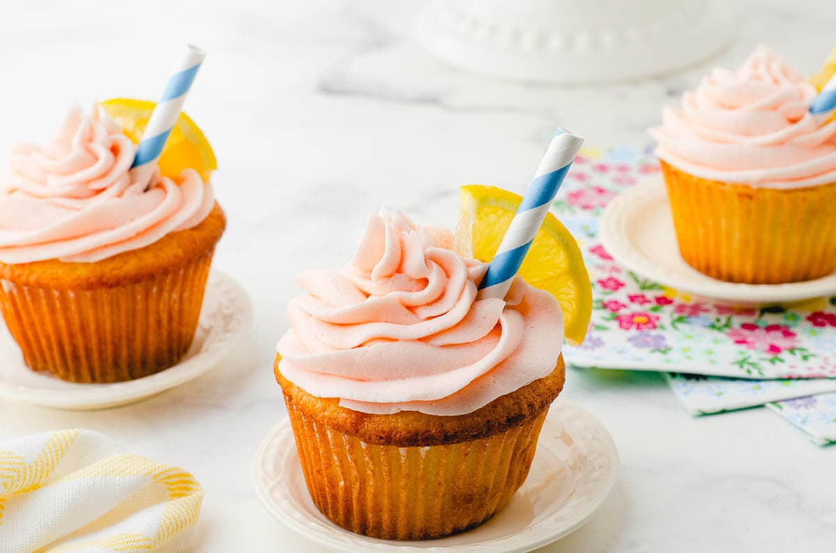 Cupcakes topped with a creamy pink buttercream.