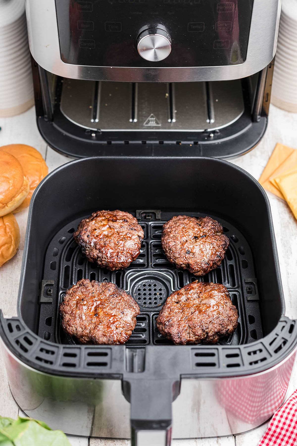 Cooked burgers in air fryer.