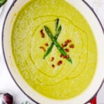 Big pot filled with creamy asparagus soup.