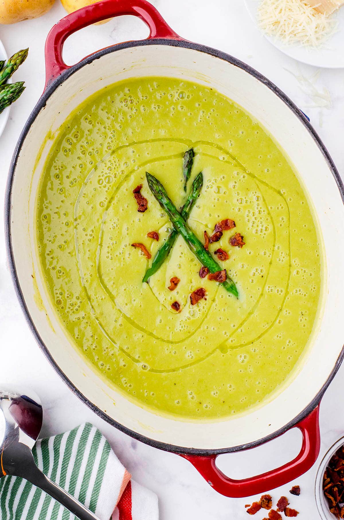 Big pot filled with creamy asparagus soup.