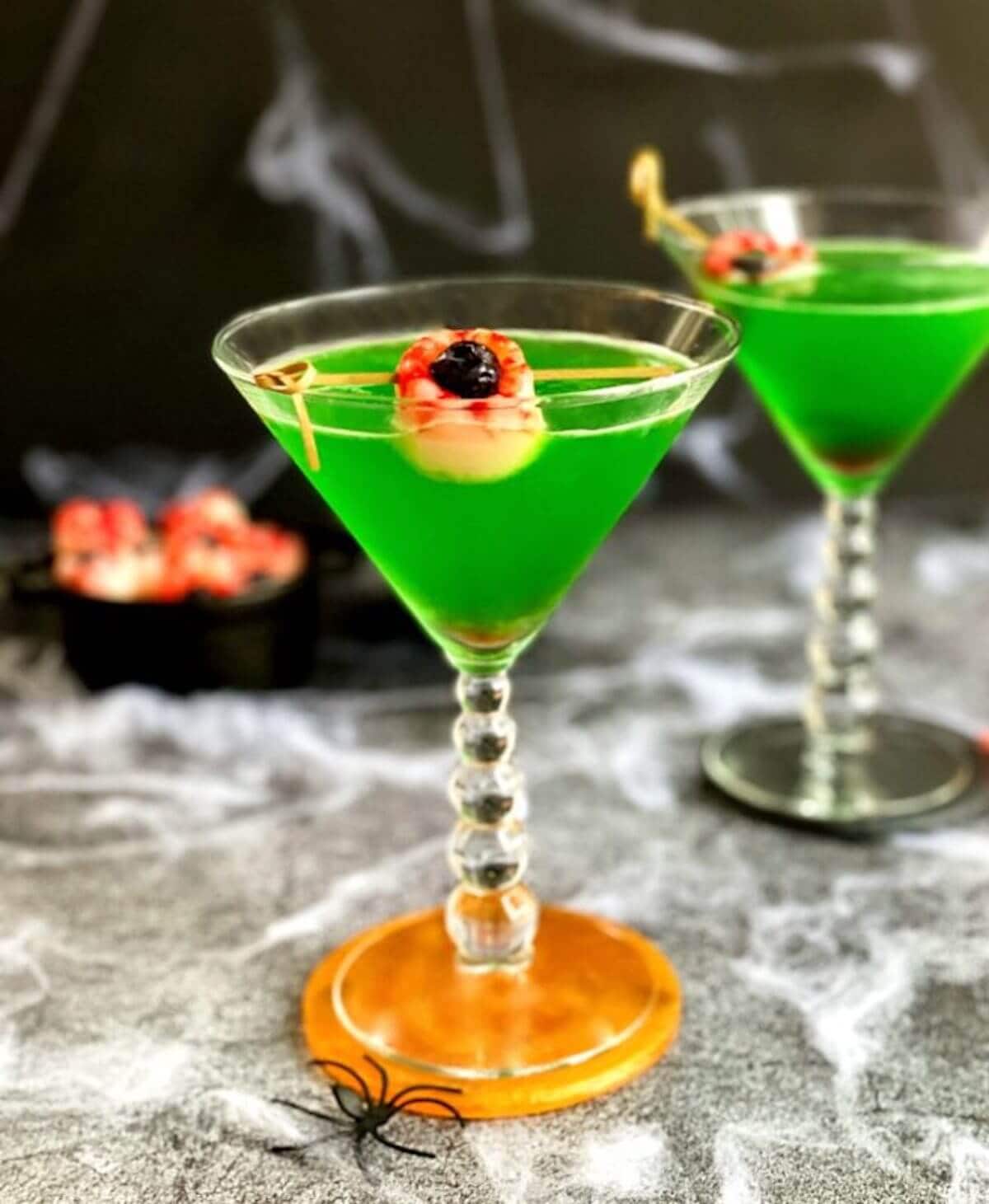 Lychee halloween cocktails in martini glass.