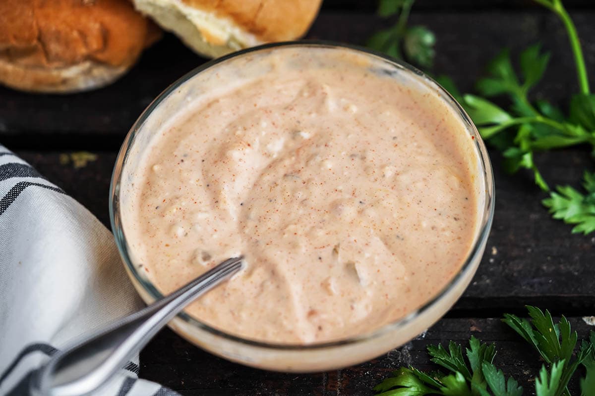 Burger sauce in bowl with spoon.