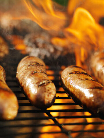 Brats on grill.