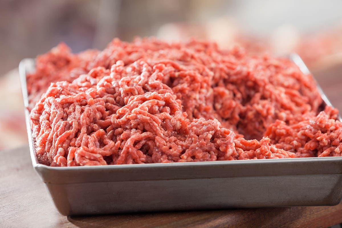 Pound of ground beef in container.