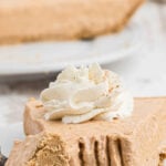 No bake pumpkin pie on plate with fork. With print overlay for Pinterest.