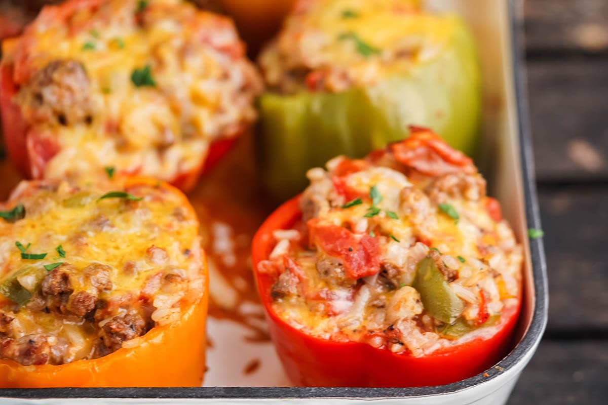 Old fashioned stuffed bell peppers recipe in casserole dish.
