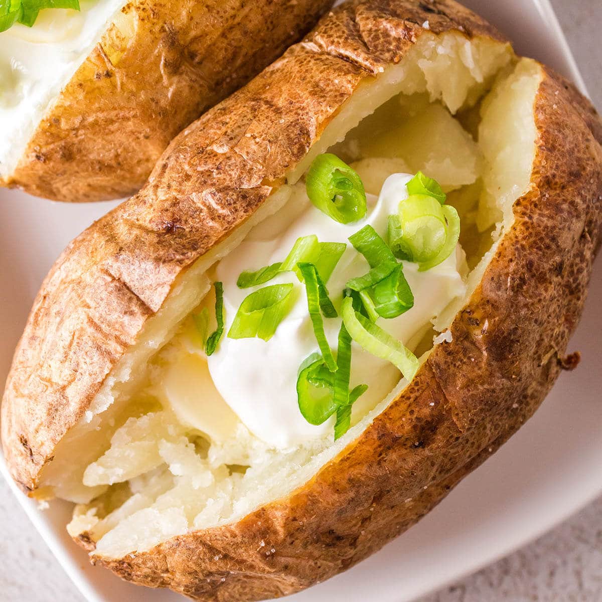 Air Fryer Baked Potatoes on platter.