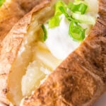 Air Fryer Baked potatoes on platter.