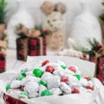 Christmas Muddy Buddies in holiday tin, with print overlay.