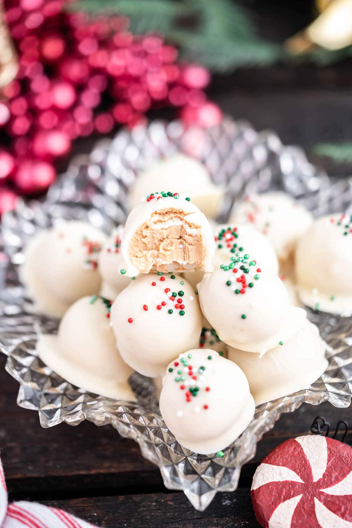 Holiday peanut butter snowballs in dish.