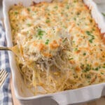 Million Dollar Chicken Casserole with serving spoon.