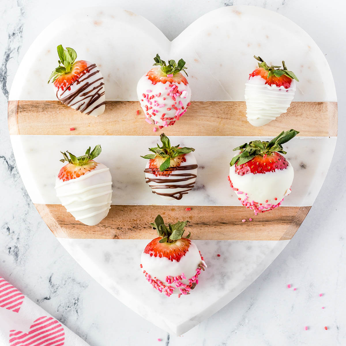 White Chocolate Covered Strawberries on a platter.