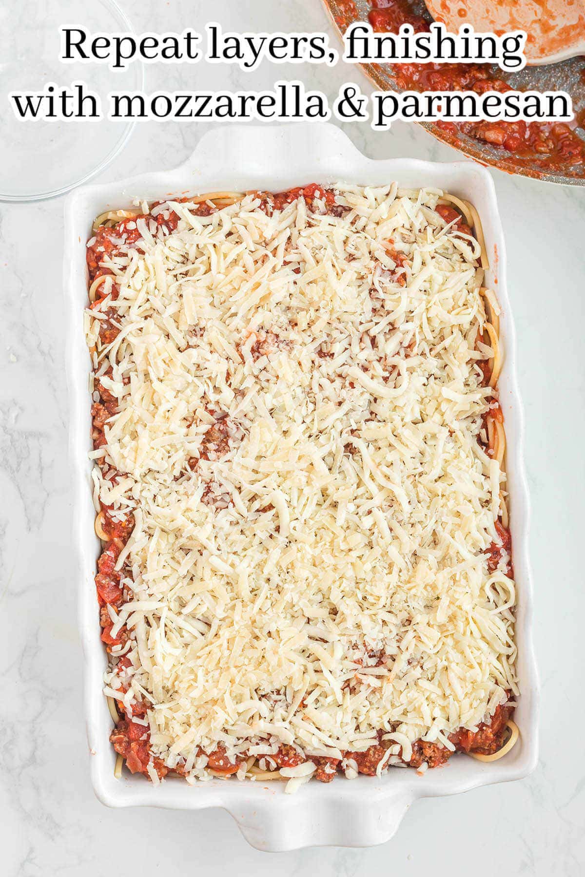 Casserole topped with cheese in baking dish with print overlay.