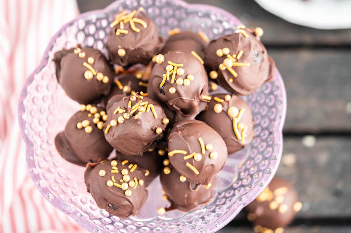 Bowl filled with chocolate truffles.