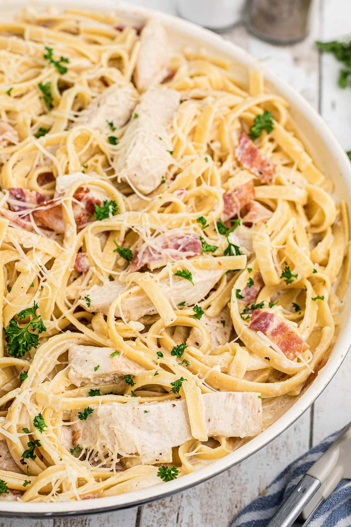 Cheesy Chicken and Bacon Pasta in a skillet.