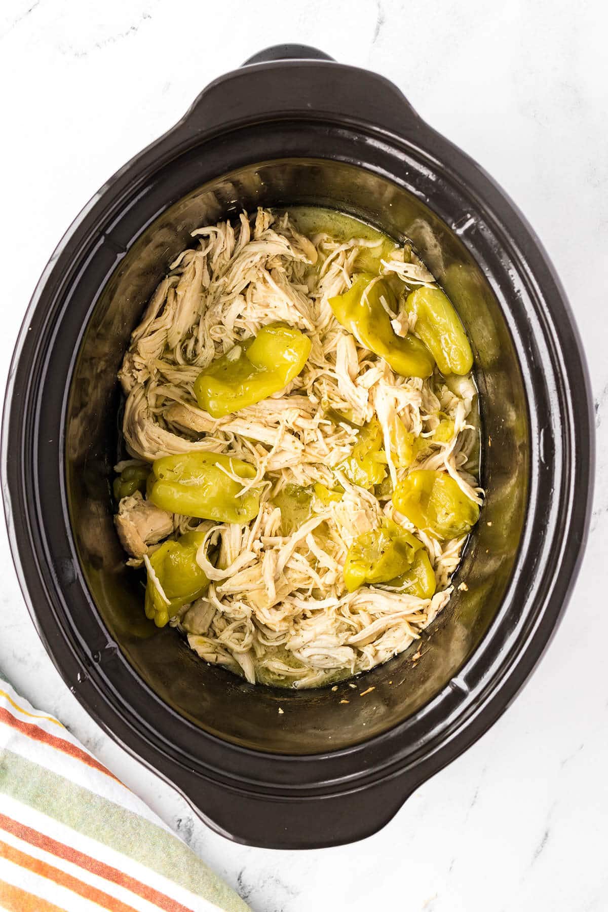 Crock Pot Mississippi Chicken in slow cooker.