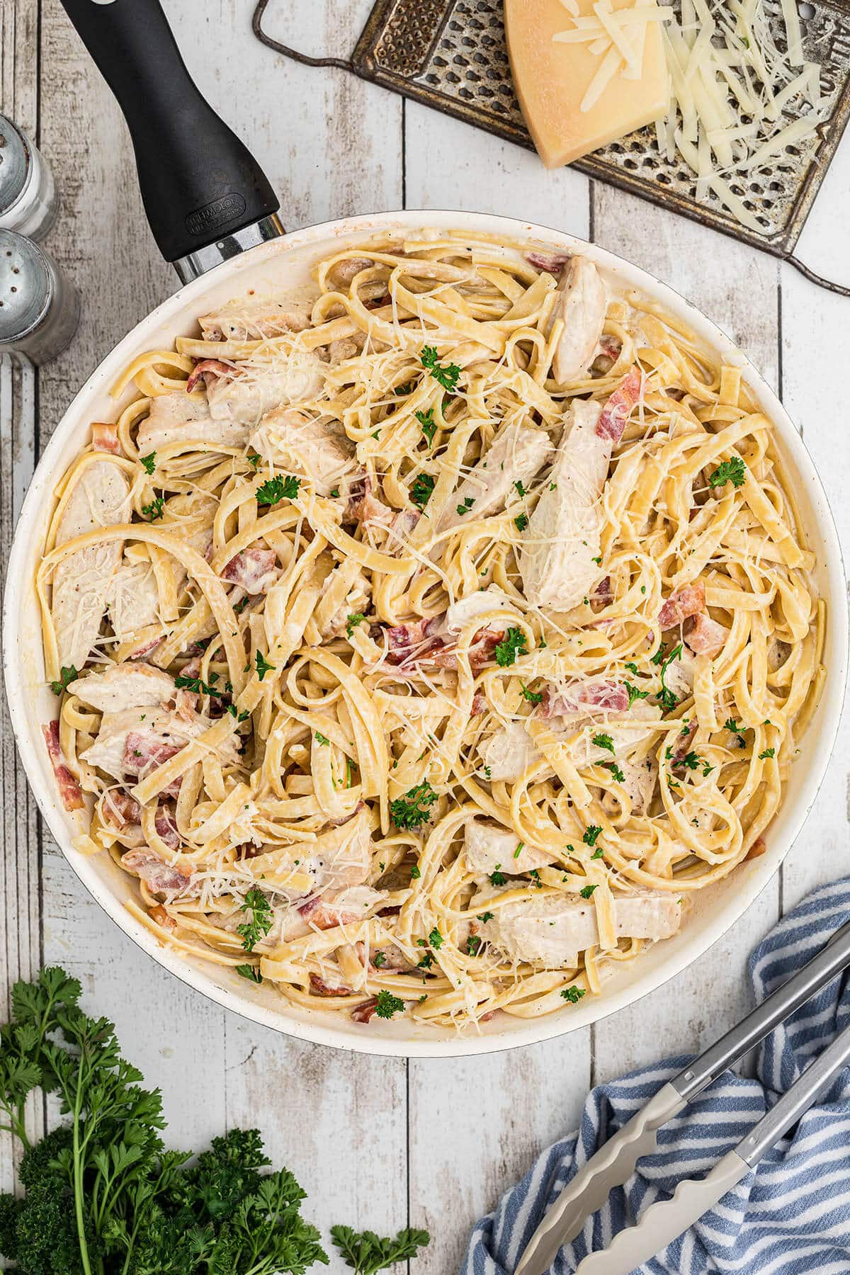 Cheesy Chicken pasta dinner in a skillet.