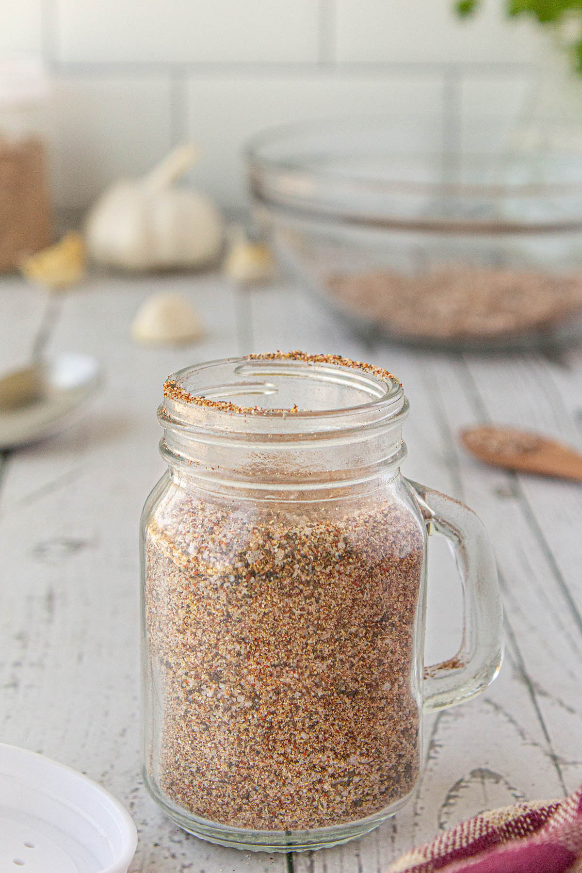 Chicken Seasoning Blend in a spice container.