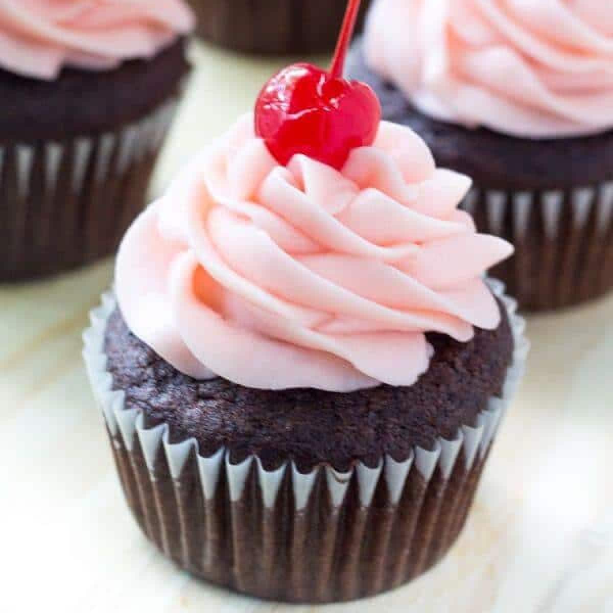 Chocolate Cherry Cupcakes on a platter.