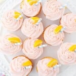 Pink Lemonade Cupcakes on a platter. With print overlay for Pinterest.