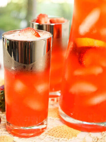 Glasses of ice cold strawberry lemonade.
