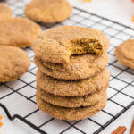 Chewy pumpkin cookies on a cooling rack.